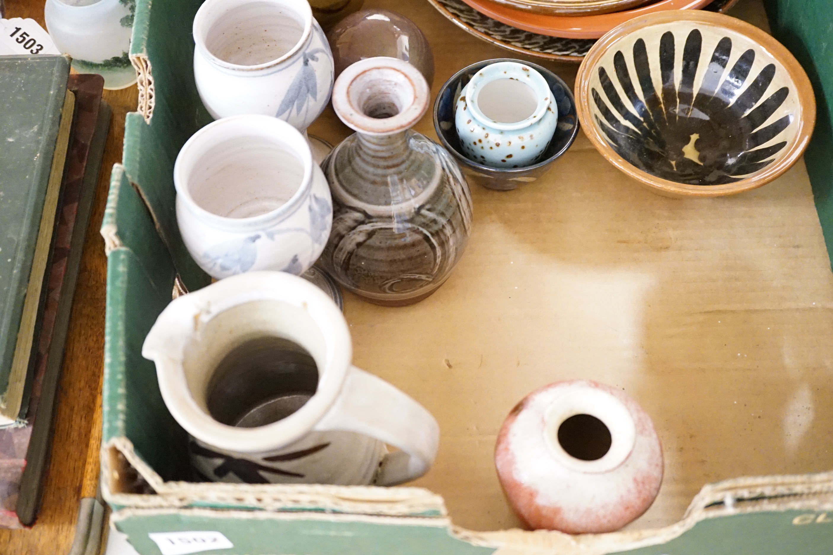 A group of European and Japanese studio pottery dishes, bowls and vases including a Boscastle R Irving plate, largest 26cm in diameter (17)